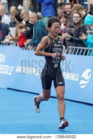 STOCKHOLM - JUL 02 2016: Triathlete Ai Ueda (JPN) running at the finish in the Women's ITU World Triathlon series event July 02 2016 in Stockholm Sweden