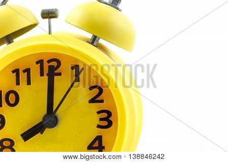 close up yellow alar clock isolation on white background