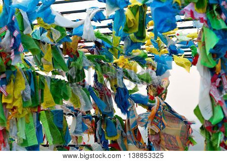 Prayer flags and Hadak at sunset in the Republic of Buryatia. Datsan Rinpoche Bagsha on Bald Mountain in Ulan-Ude, Russia.
