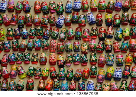 Russia Moscow - June 24 2015: Colorful russian nesting dolls matryoshka in the form of magnets at market on the Arbat. Matryoshka Babushka Are Most Popular Souvenir From Russia.