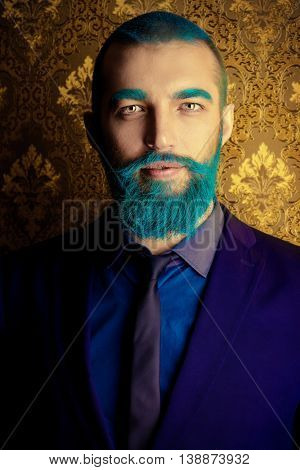 Vintage portrait of a handsome man with blue beard. 