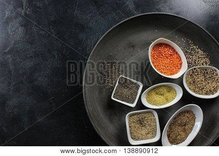 super food in bowls on dark ground