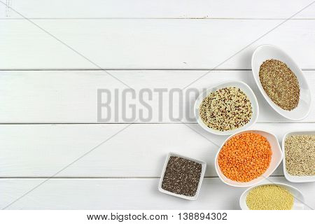 super food in bowls on dark ground