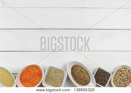 super food in bowls on dark ground