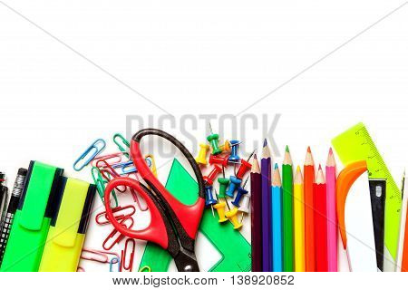 School and art supplies isolated on white background. Top view with copy space.