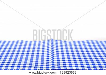 blue checked tablecloth for food serving background