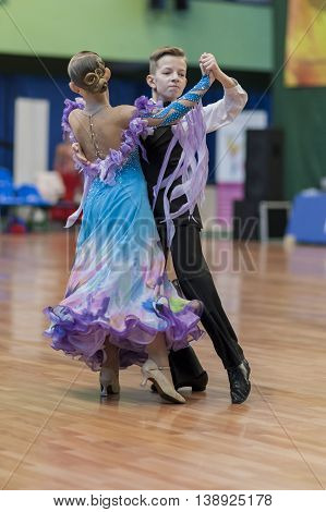 Minsk Belarus -May 28 2016: Unidentified Dance Couple Performs Juvenile-1 Standard European Program on National Championship of the Republic of Belarus in May 28 2016 in Minsk Republic of Belarus