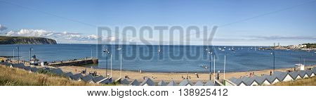 Swanage Dorset UK - July 2016. A panorama view of Swanage bay looking towards Bournemouth and Old Harry rock at Swanage in Dorset UK