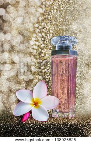 Perfume Or Au De Parfume With On Golden Luxury Glitering Bokeh
