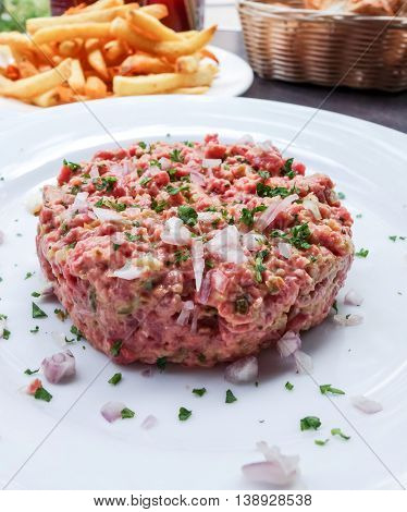 tasty Steak tartare (Raw beef) - classic steak tartare on white plate