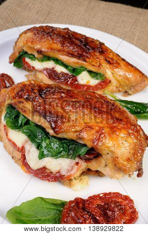 Stuffed breast baked with dried tomatoes mozzarella spinach