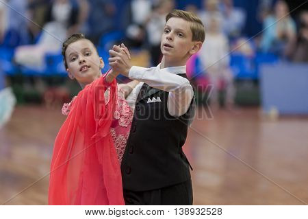 Minsk Belarus -May 28 2016: Gubeyko Aleksand and Yasevich Angelina Perform Juvenile-1 Standard European Program on National Championship of the Republic of Belarus in May 28 2016 in Minsk Republic of Belarus