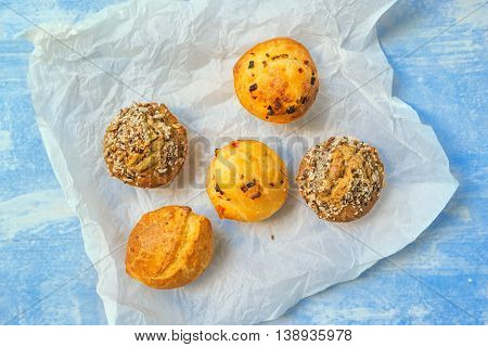 Homemade salty muffins also called proja pie traditional Balkans baked food with savory cheese ham eggs and paprika made of corn flour starch selective focus.