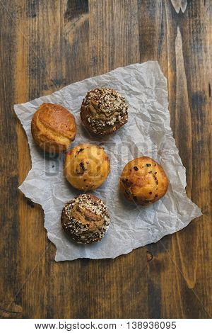 Homemade salty muffins also called proja pie traditional Balkans baked food with savory cheese ham eggs and paprika made of corn flour starch selective focus.
