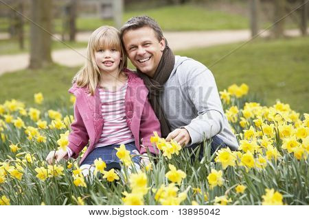 Father And Daughter In Daffodils