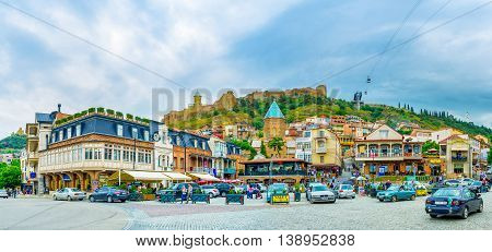 TBILISI GEORGIA - MAY 28 2016: The panorama of Vakhtang Gorgasali Square with the Narikala Fortress on the hill on May 28 in Tbilisi.