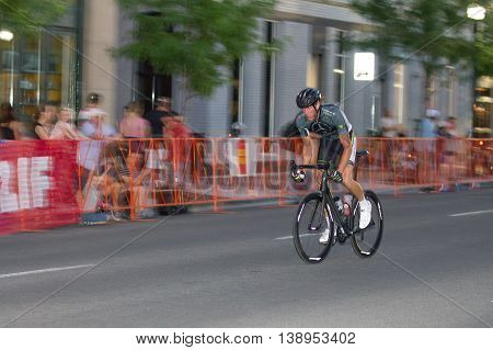 Single Guy Riding At Night Away From The Pack