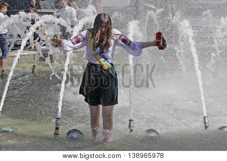 Kiev Ukraine - May 27 2016: Kiev graduates bathe in fountains. Last call 2016