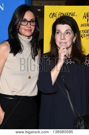 LOS ANGELES - JUL 14:  Courteney Cox & Nanci Ryder arrives to the 