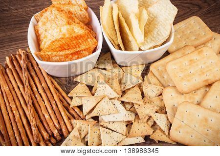Heap Of Salted Crisps, Breadsticks And Cookies, Concept Of Unhealthy Food