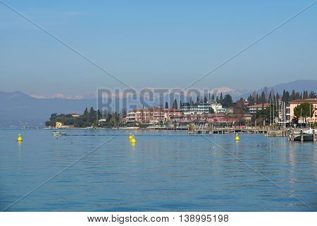 landscape of coastline of Sirmione in a winter. Sirmione is a famous vacation place in the northern Italy.