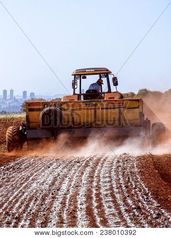 Ribeirao Preto, Sao Paulo, Brazil, May 19, 2006. Mechanized Application Of Limestone In A Field For 