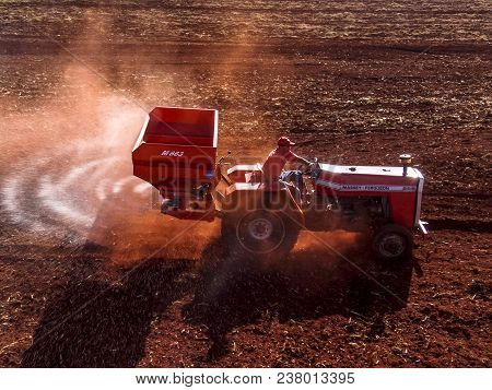 Ribeirao Preto, Sao Paulo, Brazil, May 01, 2007. Mechanized Application Of Limestone In A Field For 