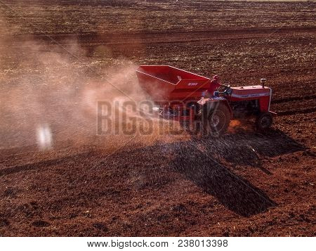 Ribeirao Preto, Sao Paulo, Brazil, May 01, 2007. Mechanized Application Of Limestone In A Field For 