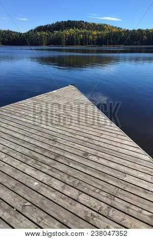 An Algonquin Dock And Lake In Fall