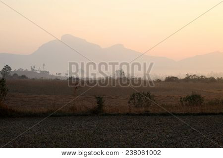 Foggy Mountain Valley At Sunrise In The Village In Nasik, Maharashtra, India