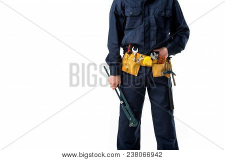 Partial View Of Plumber In Uniform With Alligator Wrench Isolated On White