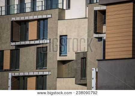 Contemporary design of multifamily living houses. Modern luxury apartments buildings