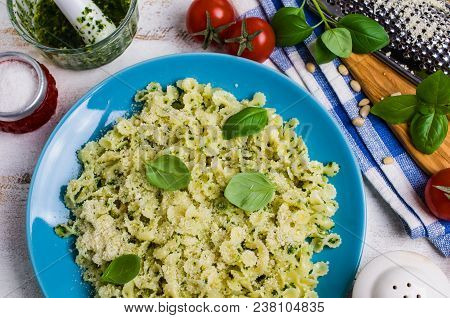 Traditional Italian Pasta With Pesto In A Plate On The Table. Selective Focus.
