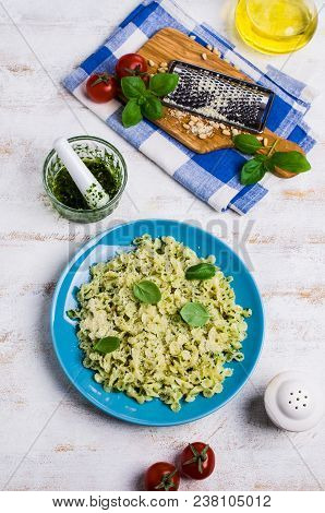 Traditional Italian Pasta With Pesto In A Plate On The Table. Selective Focus.