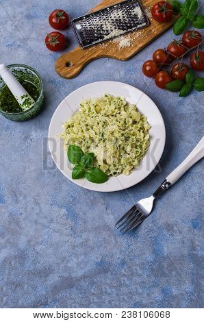 Traditional Italian Pasta With Pesto In A Plate On The Table. Selective Focus.