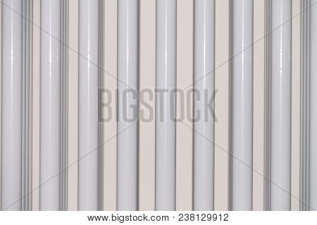 White Radiator In An Apartment. Room Battery