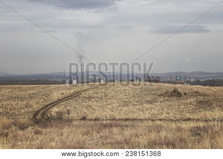 Urban landscape. Outskirts of Ust-kamenogorsk. Hills on the outskirts of the city. Nature. Grunge nature. Landscape. Grunge landscape.