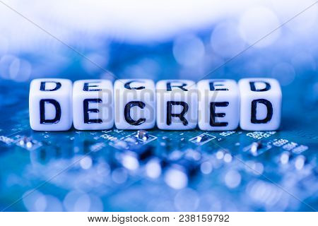 Word Decred Formed By Alphabet Blocks On Mother Cryptocurrency Closeup