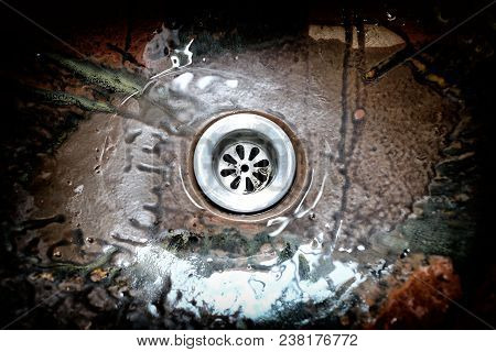 Close-up Plug Hole Of Old Grunge Basin With Len Vignette.