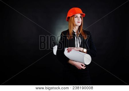 Engineer Woman In Orange Protect Helmet With Construction Paper Projekt.