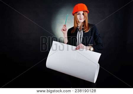 Engineer Woman In Orange Protect Helmet With Construction Paper Projekt.