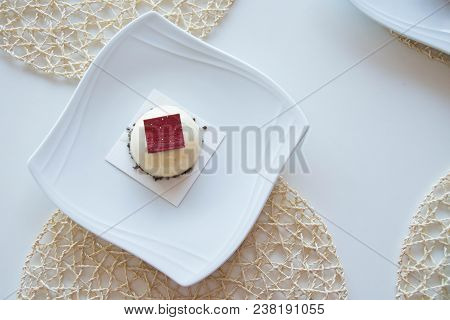 Delicious Jelly Pastry On A White Plate On The Table