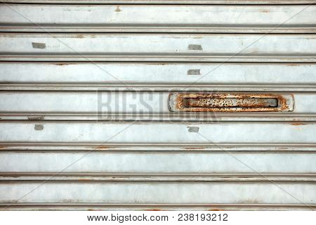 Mail Slot On Folding Metal Door, Suitable For Construction Concept.