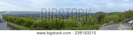 Panoramic Skyline Of Vienna Under Cloudy Sky