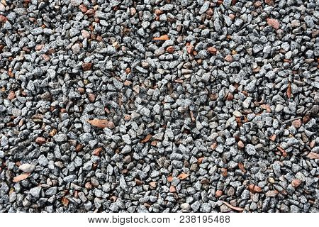 Made From Pebble Gravel Stones Different Shape As Floor Texture Background. Small Rocks Background T