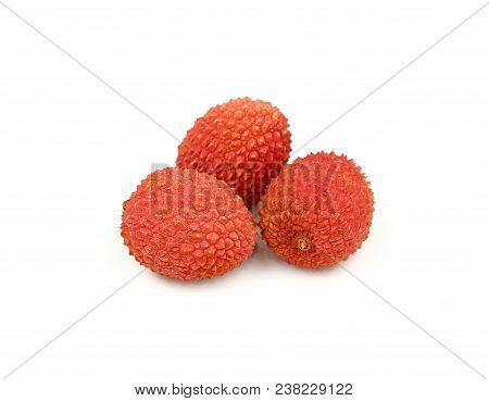 Close Up Group Of Three Fresh Red Ripe Lychee (litchi Chinensis) Tropical Fruits Isolated On White B