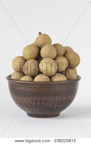 Longan In Ceramic Pial Isolated On White Background - (exotic Fruit)