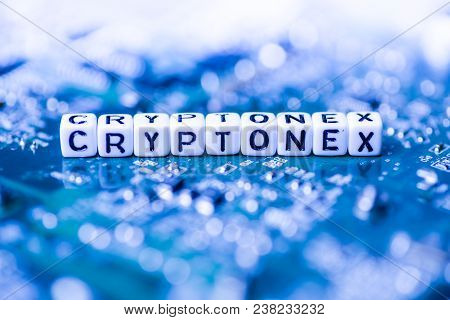 Word Cryptonex Formed By Alphabet Blocks On Mother Cryptocurrency Closeup