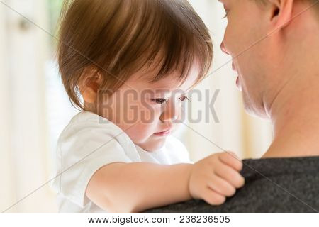 Upset Toddler Boy Crying With Tears On His Cheeks