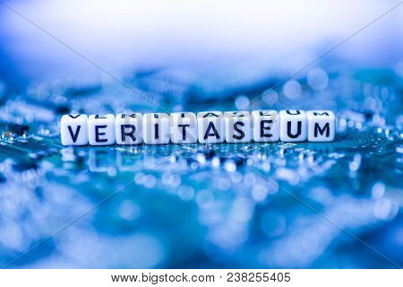 Word Veritaseum Formed By Alphabet Blocks On Mother Cryptocurrency Closeup